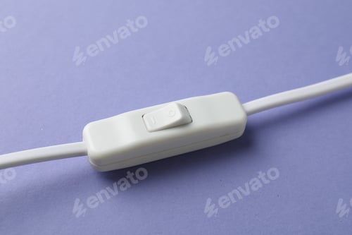 Preview: Cord switch for lamp on violet background, closeup