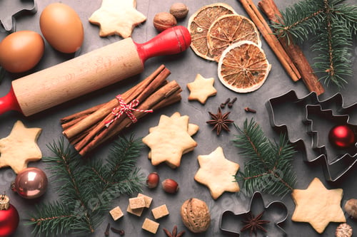 Preview: Merry Christmas and Happy Holidays greeting card with cookies, spices and fir tree branches
