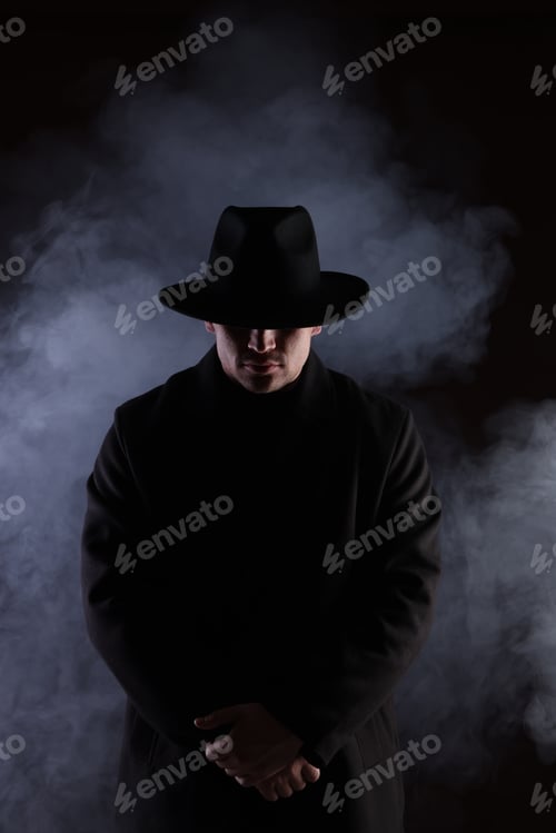 Preview: Man wearing stylish hat on black background with smoke