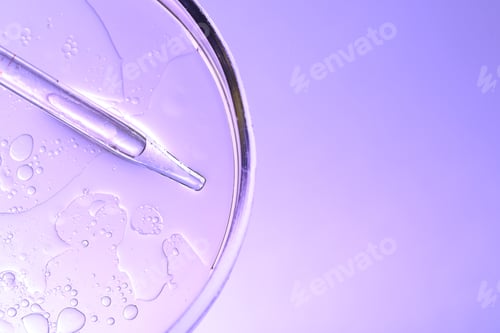 Preview: Dripping liquid from pipette into Petri dish on color background, top view. Space for text