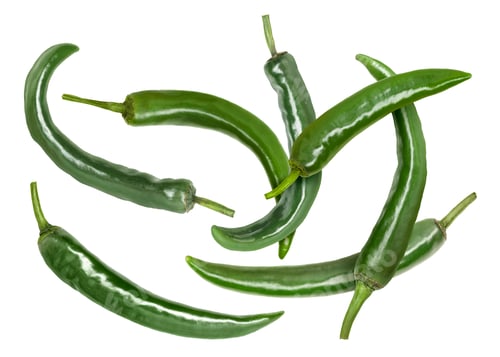 Preview: Green chili peppers flying in air on white background