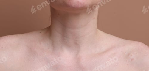 Preview: Woman with beautiful skin on beige background, closeup