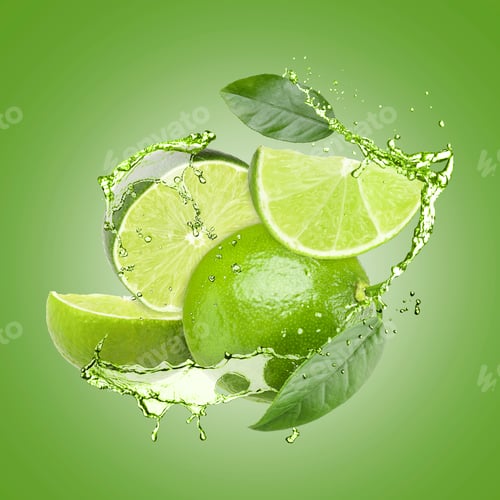 Preview: Fresh limes, leaves and drink splash in air against green background