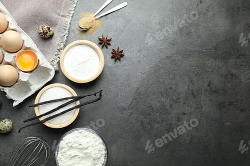 Preview: Baking powder and other ingredients on grey table, flat lay. Space for text