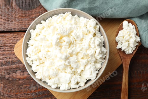 Preview: Tasty cottage cheese on wooden table, top view