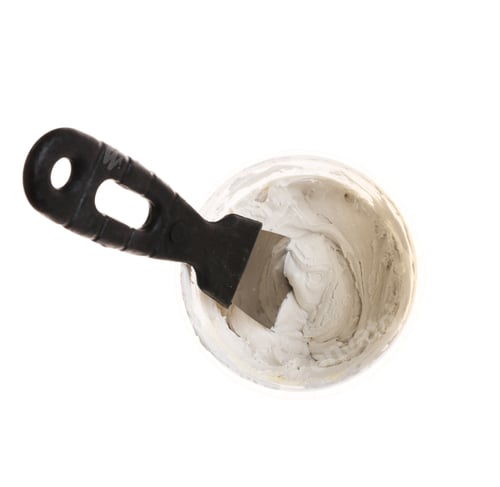Preview: Putty knife with plaster isolated on white, top view