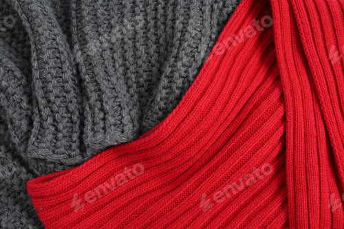 Preview: Soft knitted scarfs as background, top view