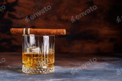 Preview: Glass of whiskey with ice and cigar