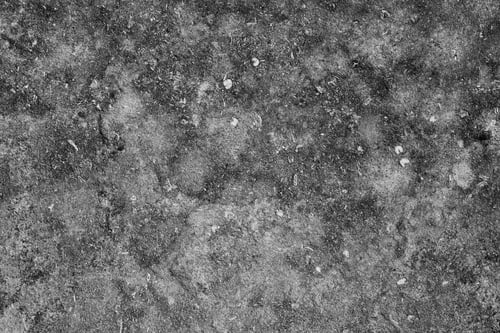 Preview: Cracked and textured grey concrete surface with small debris