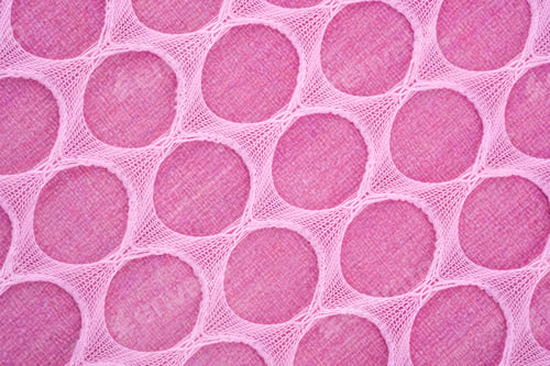Preview: Pink fabric with a geometric dot pattern