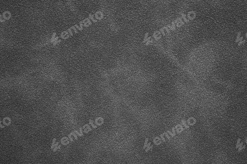 Preview: Close up of dark grey sand texture for background and design Dark coarse sand surface showing granul