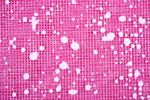 Preview: Pink woven fabric with white splattered paint texture