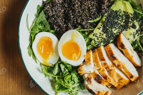 Preview: Healthy quinoa chicken salad with avocado and eggs for clean eating and nutrition concept