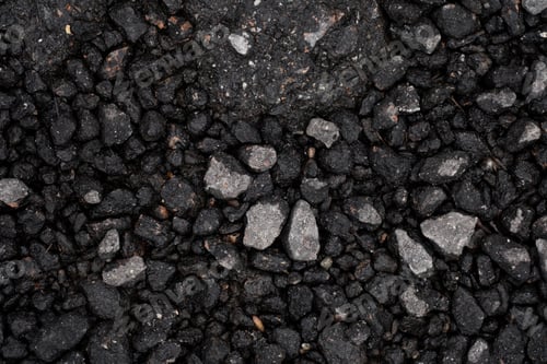 Preview: Close up of asphalt road surface with small grey stones