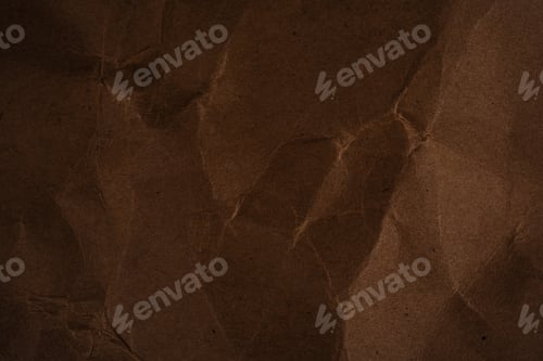 Preview: Dark brown wrinkled paper texture with folded crumpled surface abstract background