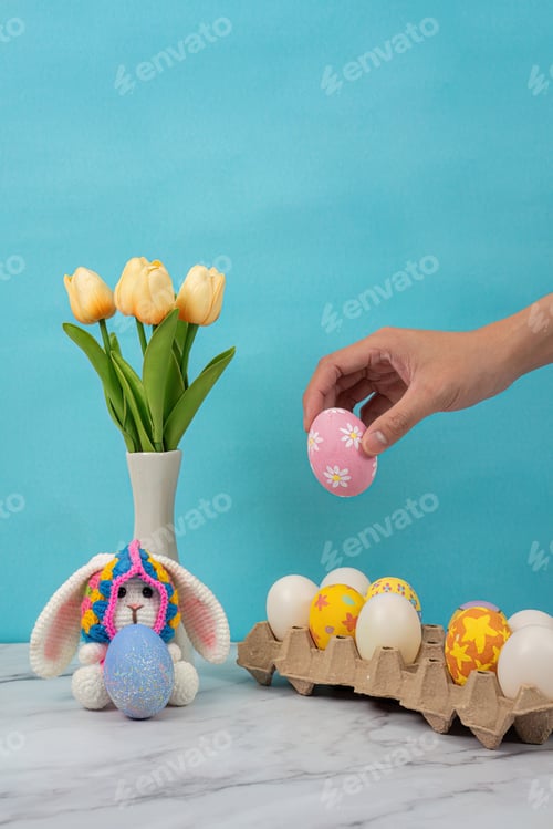 Preview: SSTK Easter. Colorful Easter eggs and flowers for festive celebration.