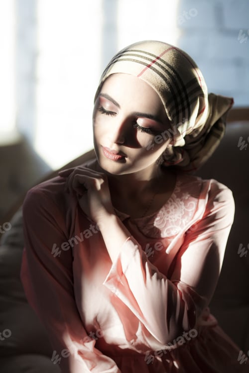Preview: Young arab girl with oriental makeup in hijab