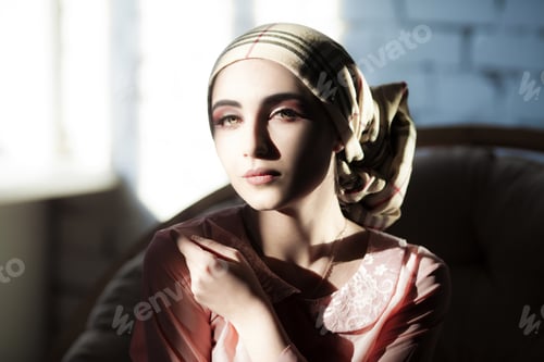 Preview: Young arab girl with oriental makeup in hijab