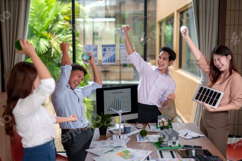 Preview: Excited team celebrating renewable energy project success