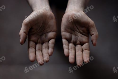 Preview: Dirty hand in begging gesture. Poverty and humanitarian crisis