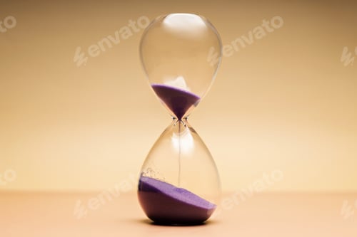 Preview: Hourglass with purple sand, passing time, aging process and life transition concepts