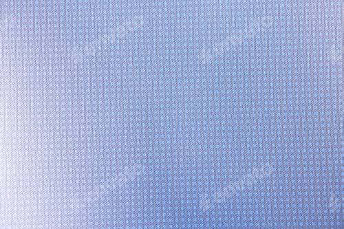 Preview: Close up of light blue textured background with soft white highlights and fine pale checkered patter