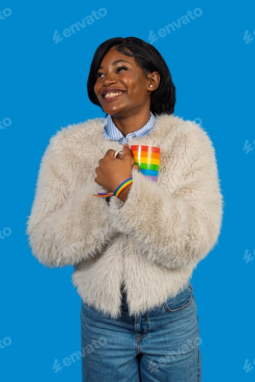 Preview: Black woman holding rainbow mug celebrating pride