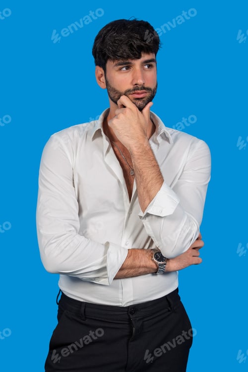 Preview: Young man thinking having ideas on blue background