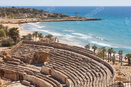 Preview: Ancient roman amphitheater in Tarragona coastline. Spanish mediterranean beach. Catalonia