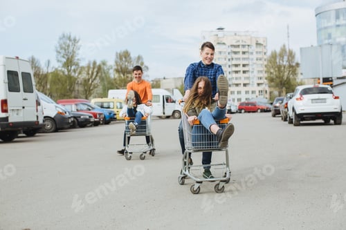 Preview: Teenagers racing shopping carts in a parking lot, finding joy and freedom in youth together