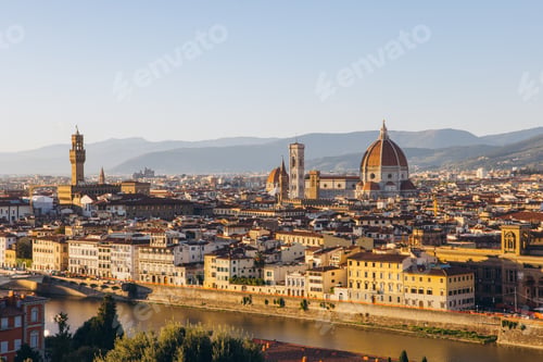 Preview: Sunset cityscape of Florence with Duomo di Santa Maria del Fiore and Arno River viewed across the hi