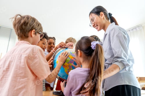 Preview: Lower view of teacher give the question abut country on earth and tell the kids point on model globe