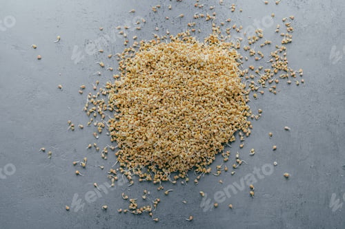 Preview: Buckwheat sprouts on grey background. Organic food. Natural healthy vegetarian food. Raw green buckw