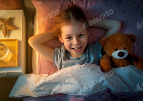 Preview: Happy Little Girl in Cozy Bed at Night