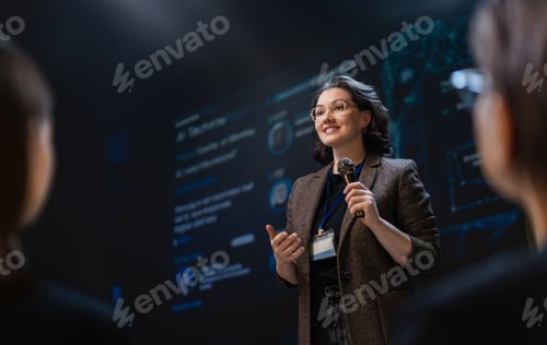 Preview: Confident Businesswoman Giving Inspiring Presentation at Technol