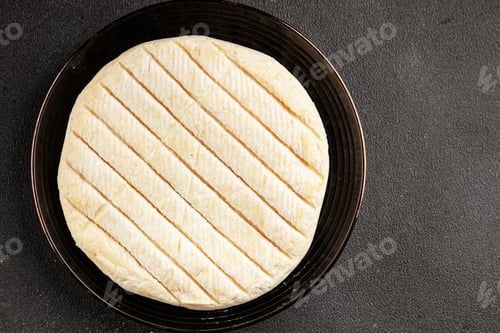 Preview: Soft cheese Camembert, Brie, or Coulommiers cheese head tasty snack fresh gourmet food background on