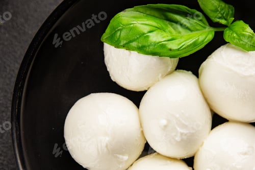 Preview: Mini mozzarella or mini burrata soft, young cheese lunch or dinner tasty snack organic fresh and del