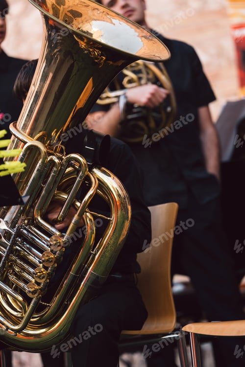 Preview: Young spanish musicians performing a street concert with brass instruments