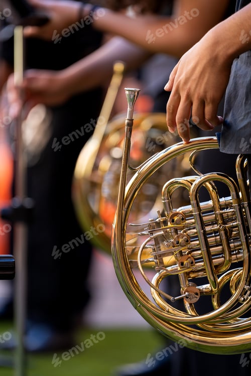Preview: Young spanish musician performing brass instrument at street concert