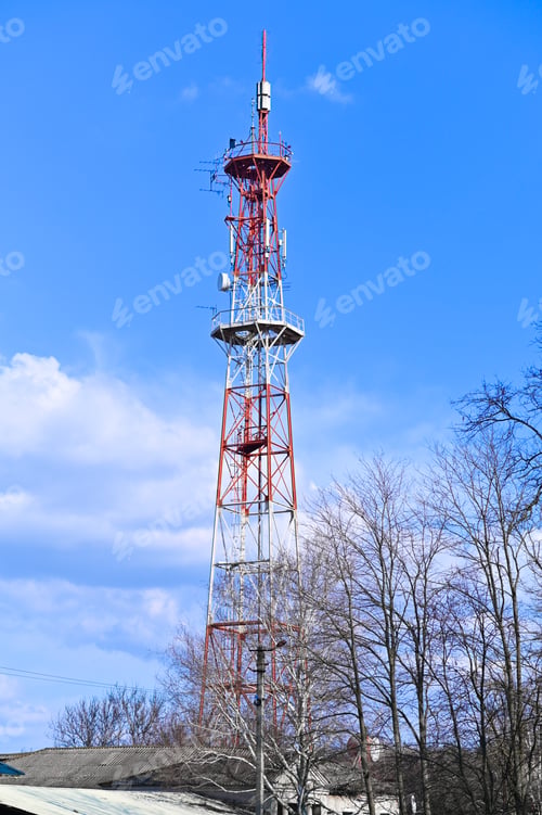 Preview: Tall telecommunications tower with red and white structure,