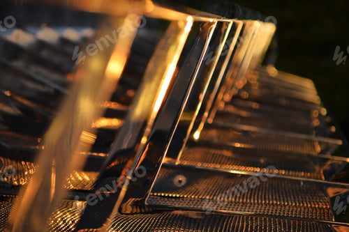 Preview: Some Metal Seats or Railings in Golden Hour Sunshine Light