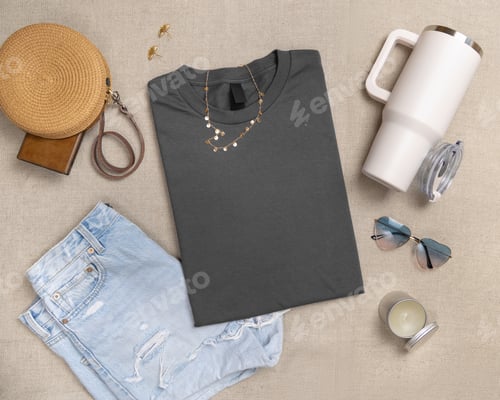 Preview: Blank dark gray folded shirt mockup with woman summer accessories, template for print on demand