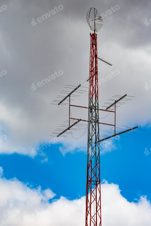 Preview: Radio antennae a central metal pole and aerials with a shaped metal skeleton dish at the top.