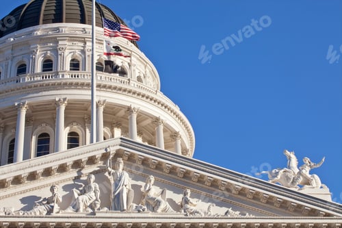 Preview: California State Capitol Building with American and California flags, Sacramento.