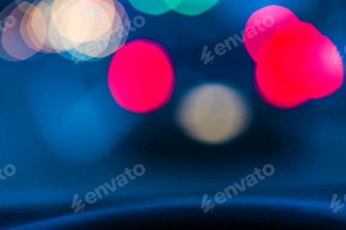Preview: Blurred tail lights in urban road scene at night, Seattle