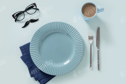 Preview: Table setting with plate coffee and cutlery top view