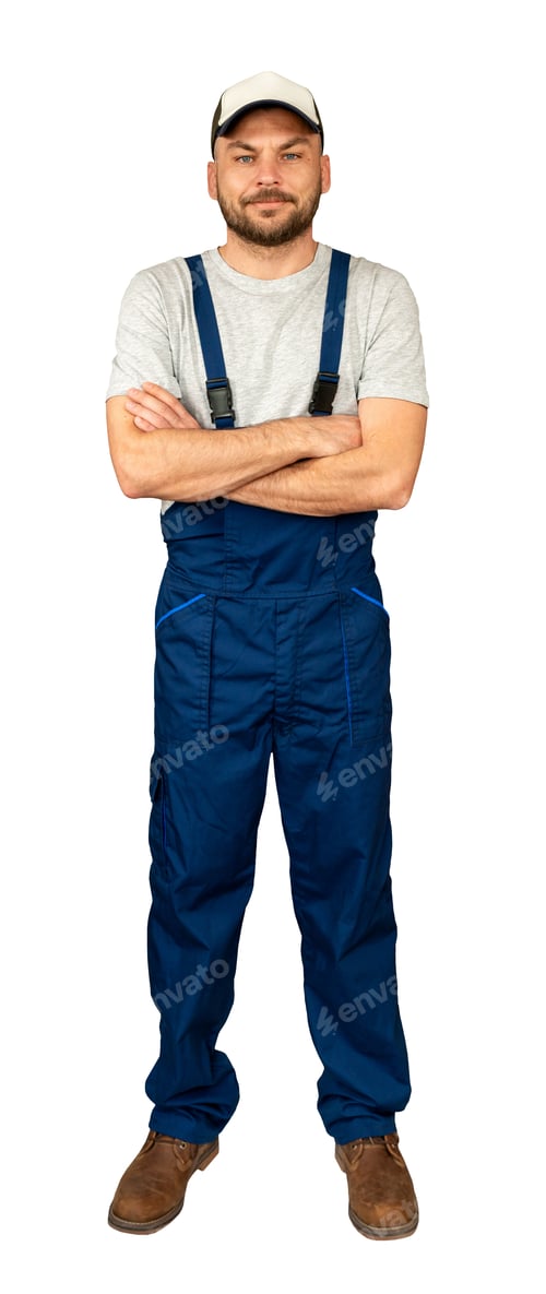 Preview: Full-length portrait of male technician in overalls standing with crossed arms.