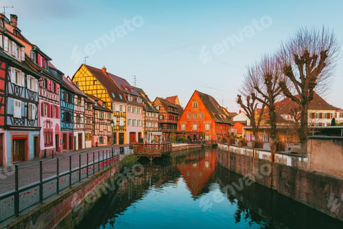 Preview: Empty Alsatian alley at dawn with soft morning mist in Colmar in Alsace France