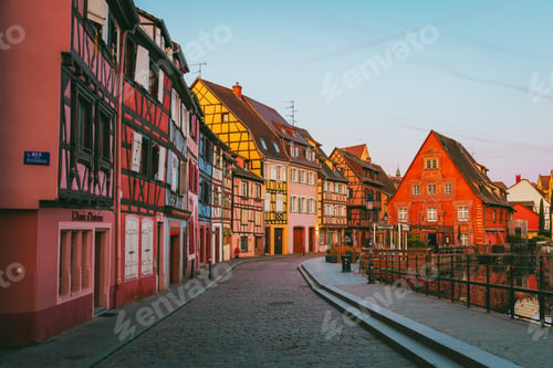Preview: Traditional Alsatian canal scene at dawn with soft pastel morning light