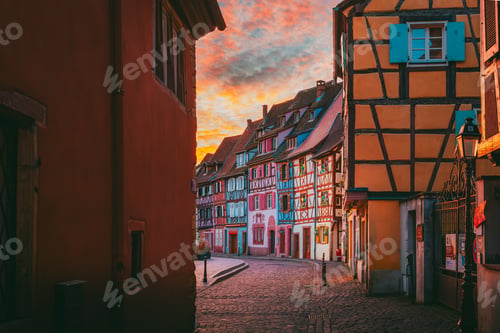 Preview: Atmospheric dawn scene in Colmar with purple sky over old town rooftops